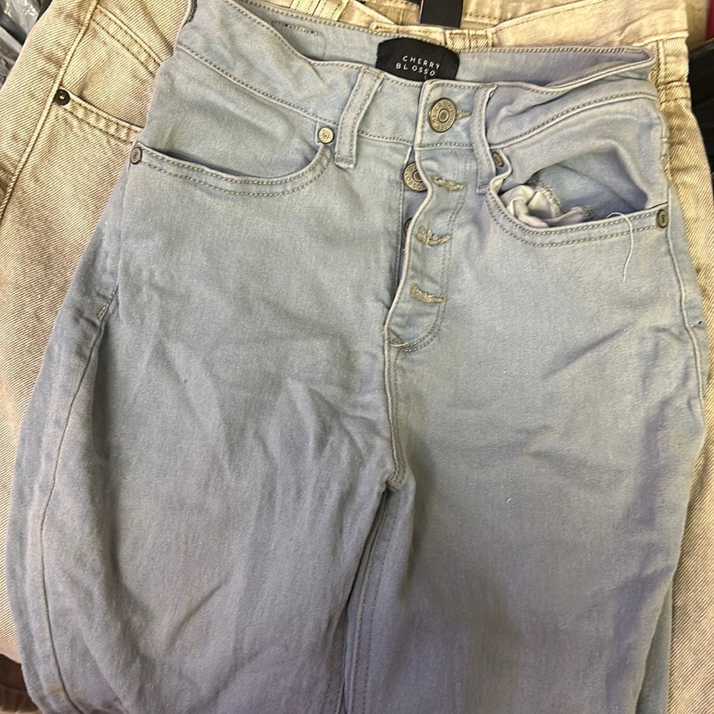 woman’s jeans light blue,camouflage,blue Jean,and dark blue all size 3